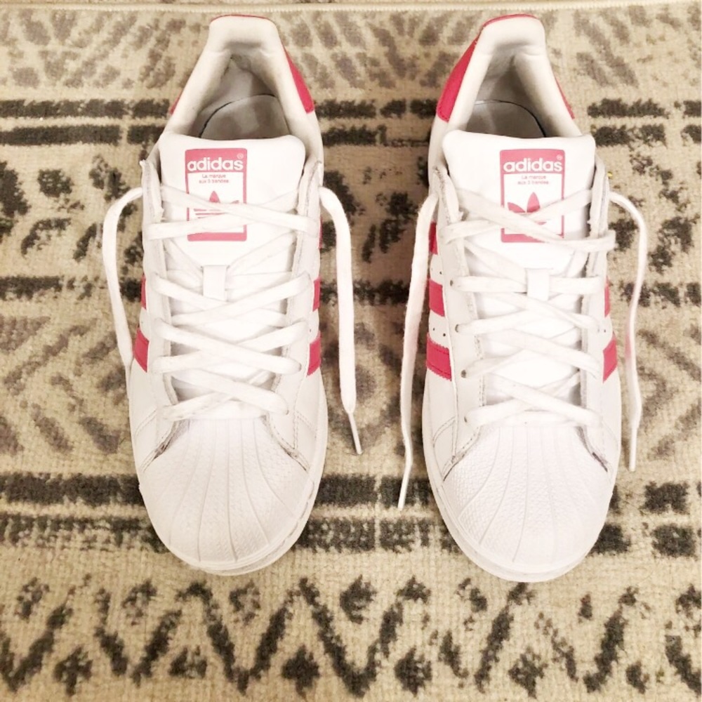 Pink and white striped adidas sneakers